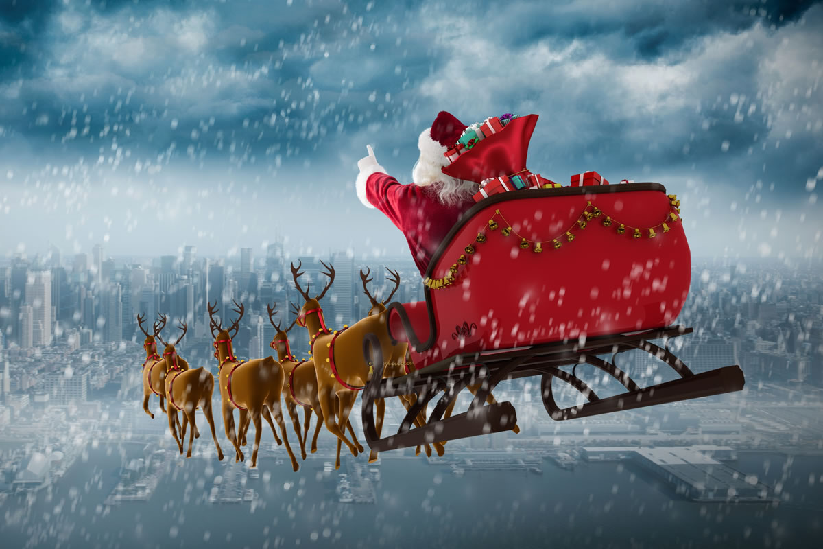 Representación de Santa Claus llegando a la ciudad con sus renos. Foto: 123 Dentist