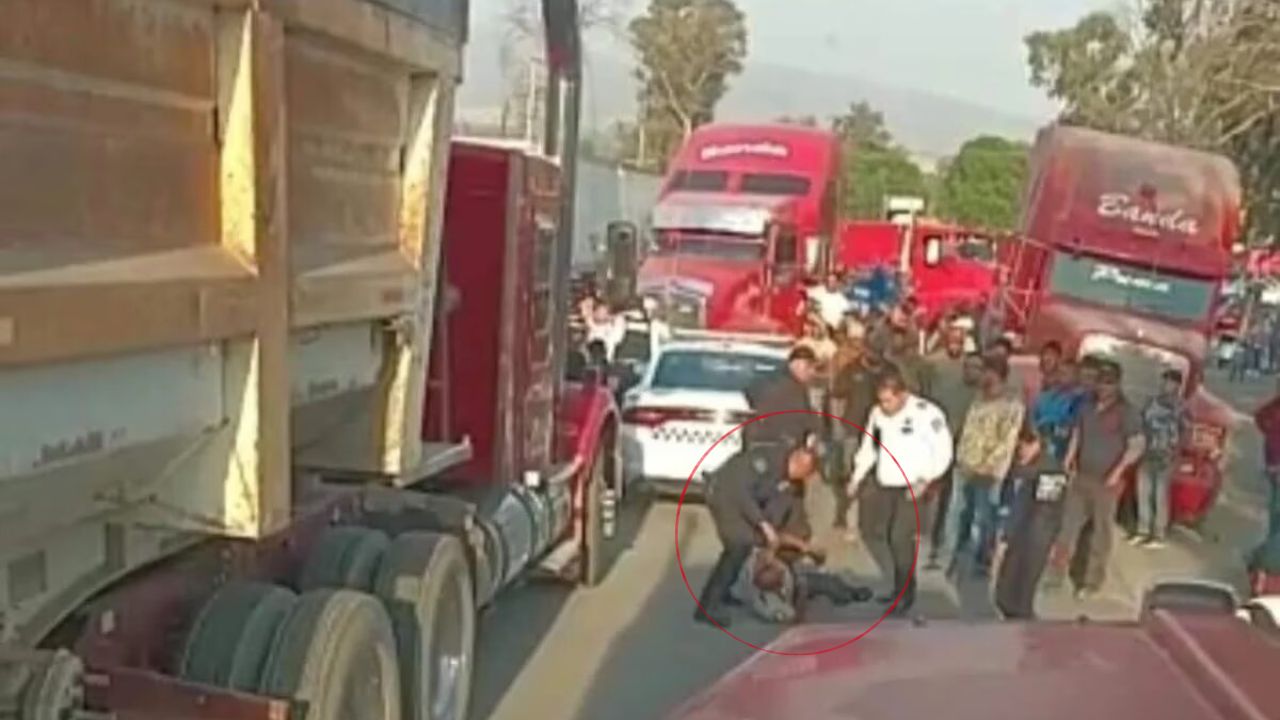 Imagen de Policías municipales golpean a agente de la Guardia Nacional en  operativo vial