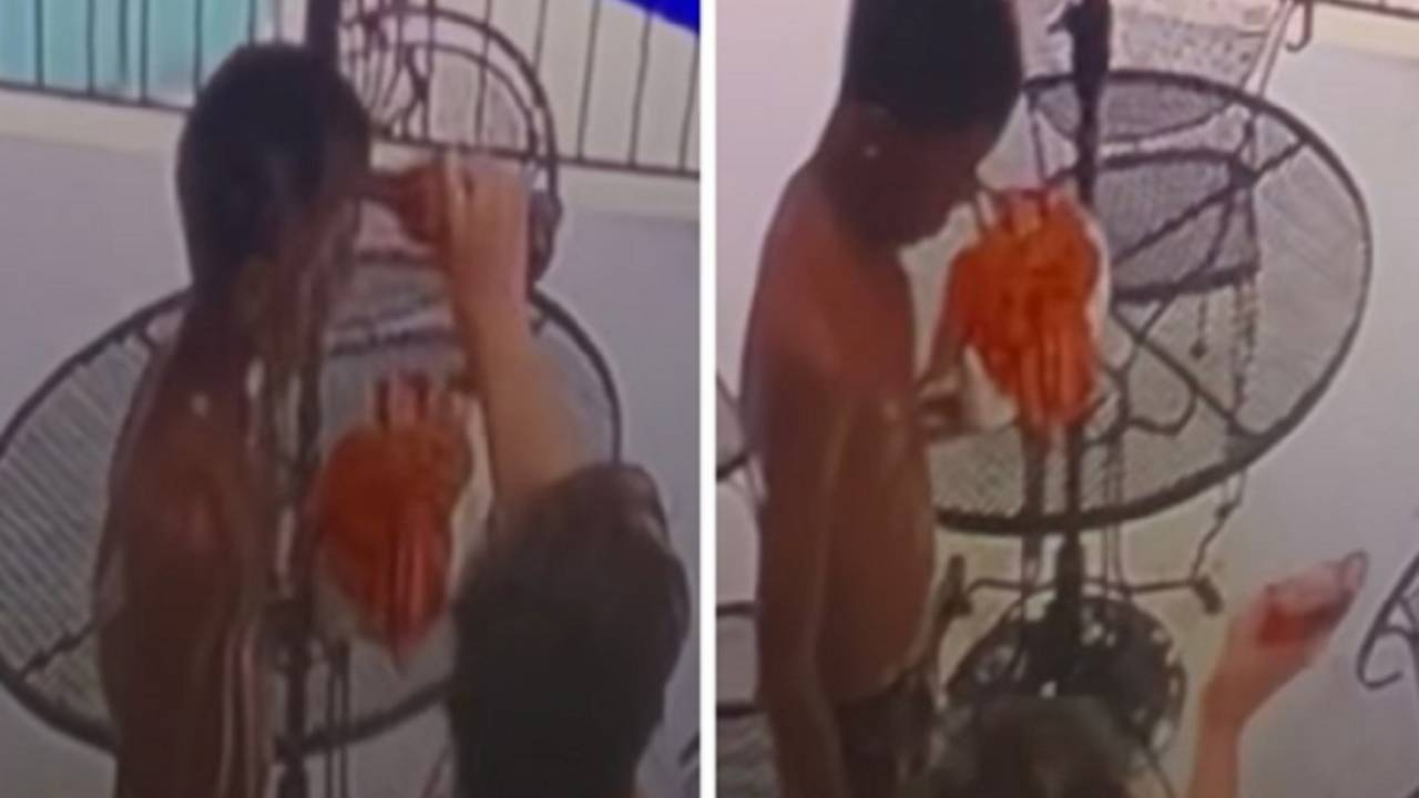 Imagen de VÍDEO: Mujer golpea y lanza refresco a niño afrodescendiente  que usó una piscina