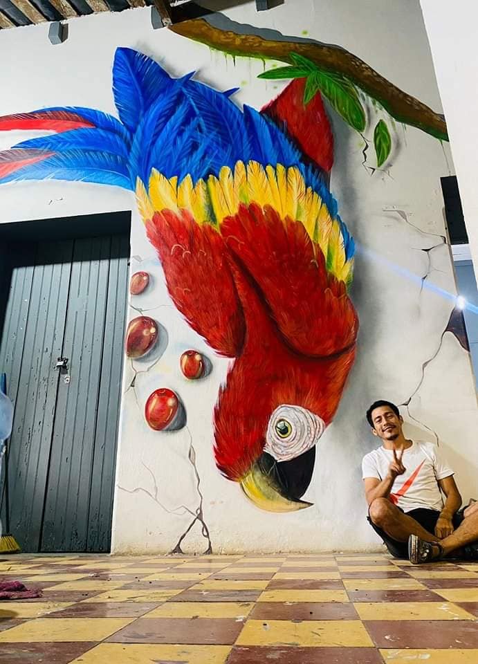 Mural de la guacamaya creada por el hondureño en Copán.