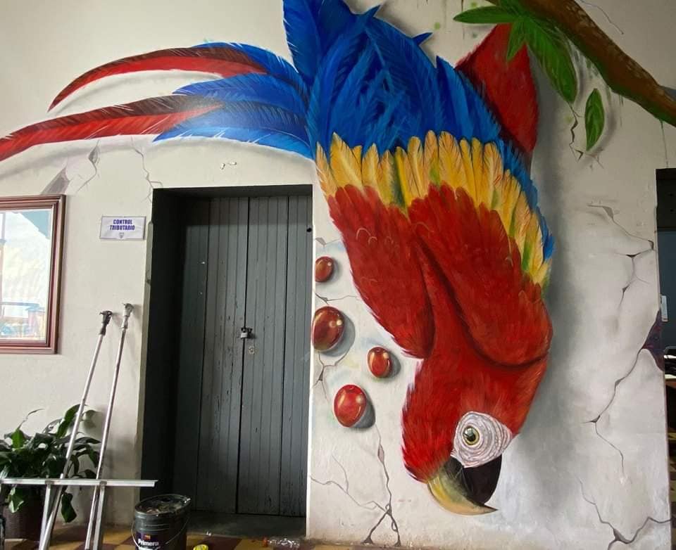 Mural de la guacamaya creada por el hondureño en Copán.