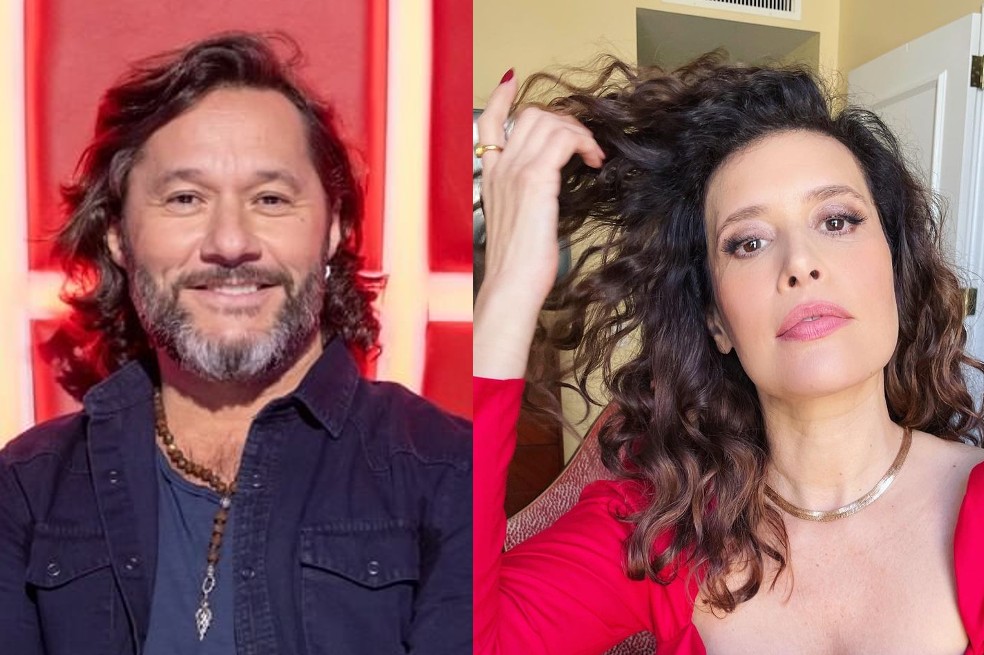 Diego Torres sonriendo y Angie Cepeda tocando su cabello con la mano 