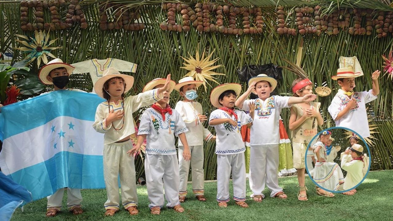 niños vestidos de indios cantando
