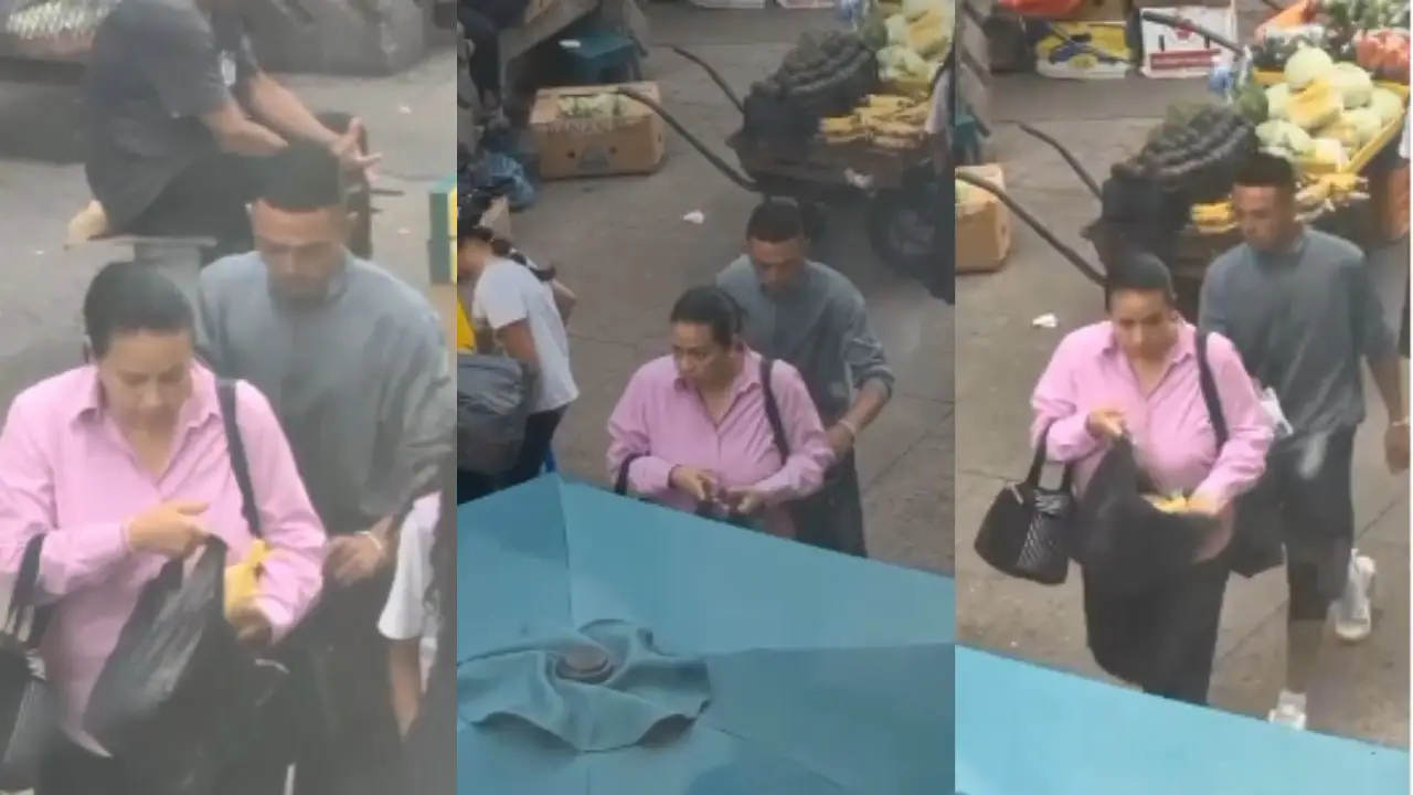 Joven 'bolsea' a mujer que va caminando en el centro de Tegucigalpa Imagen de Joven 'bolsea' a mujer que va caminando en el centro de Tegucigalpa