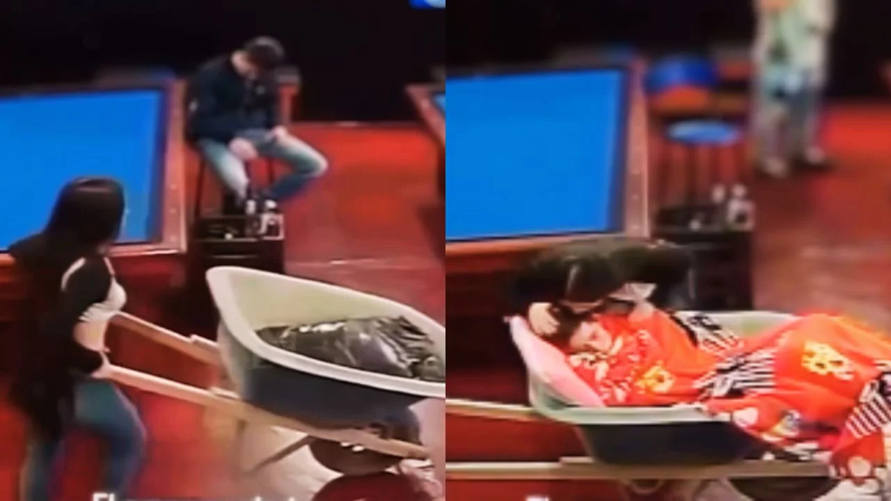 Imagen de Vídeo: Sin hacer escándalo, mujer recogió a su pareja, pasado de copas, en un billar