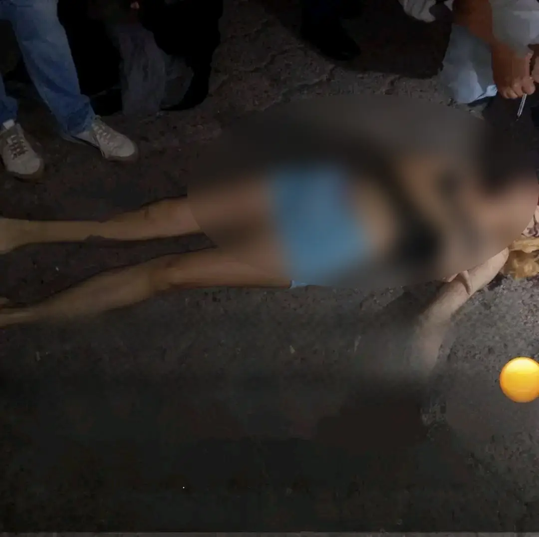 cuerpo de la joven asesinada en Comayagüela frente a su madre