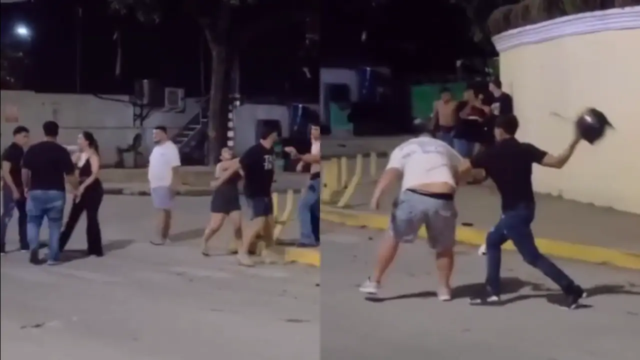 Imagen de ¡Con casco y todo! Graban pelea entre varios hombres en calle de Tela