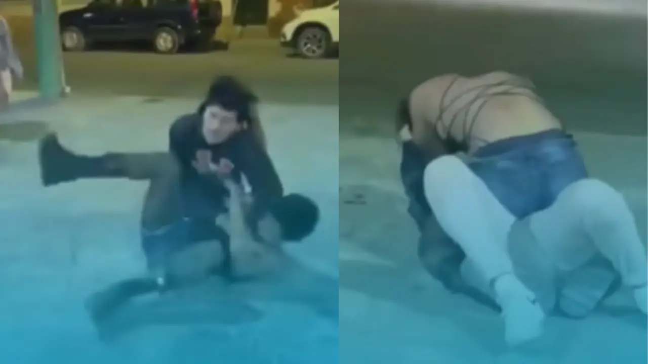 Dos personas peleando