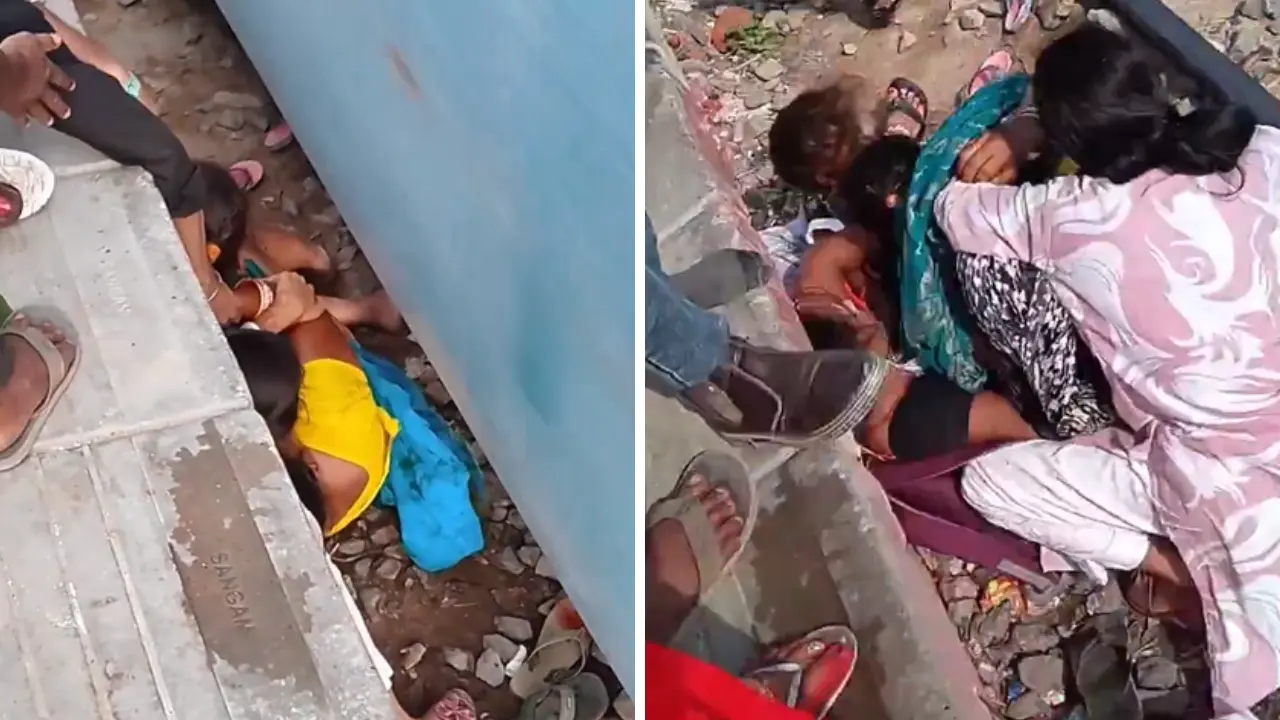Imagen de Video sensible: Madre protege a sus hijos tras quedar atrapados en vías de tren