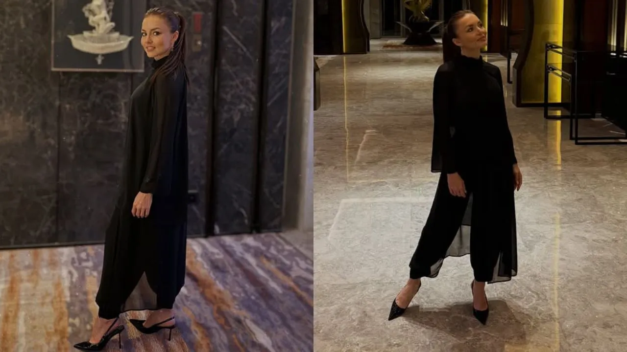 Angelique Boyer con un vestido negro.