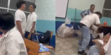 Imagen de 'Cabeza de p***': graban a alumnos peleando dentro del aula en Cortés