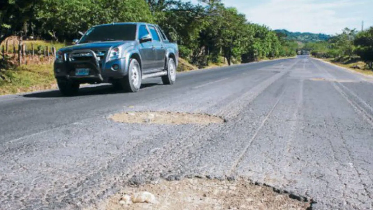 Productores suspenden toma en la CA-13 tras promesa de bacheo en Atlántida Imagen de Productores suspenden toma en la CA-13 tras promesa de bacheo en Atlántida
