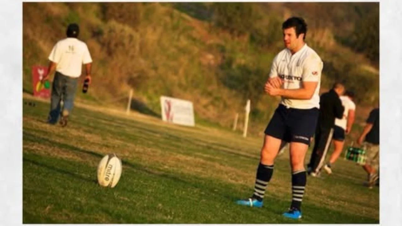 Justin Sturrock jugando Rugby.