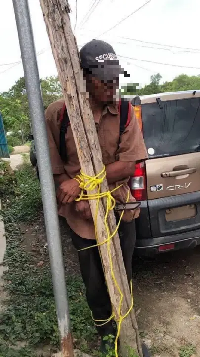 Hombre amarrado por robar yuca