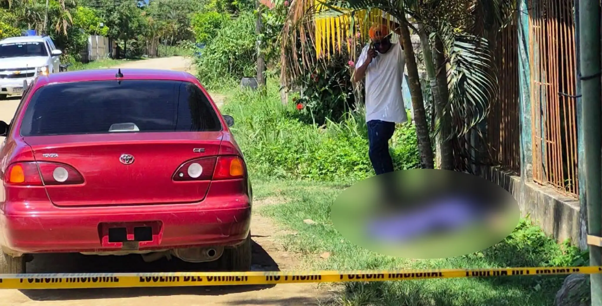 escena donde padre e hija fueron asesinados en Puerto Cortés